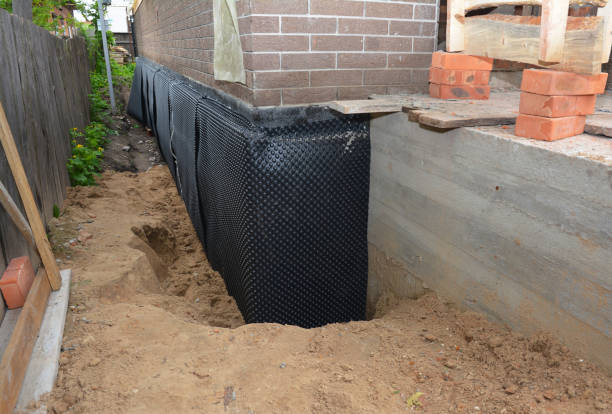 SJ Waterproofing Pros technician performing targeted Foundation Crack Repair assessment in Kintnersville, PA